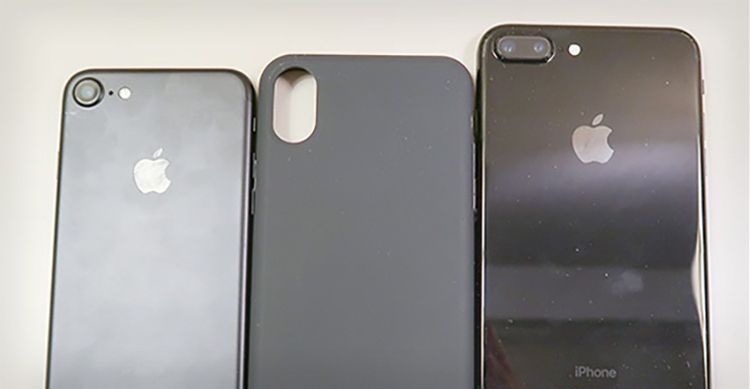 The cover of an iPhone 8 is compared with the current iPhone 7 Plus  to understand differences in size [Video]